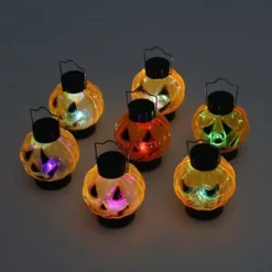12pcs Light Up Halloween Pumpkin Jack O Lantern 12 12pcs Light Up Halloween Pumpkin Jack O Lantern -Spirit Halloween Shop 4 Light Up Pumpkin Lanterns 12 Pcs 1 600x600 1