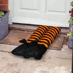 Orange Wicked Witch Legs Decoration 19.5in -Spirit Halloween Shop 4 f1f3f329 6e60 4c6f 9b8e fad58ee05dca 600x600 1