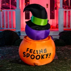 5ft Witch's Cat In Pumpkin Inflatable Decoration -Spirit Halloween Shop 5 ft Cute Witchs Cat in Pumpkin 2 600x600 1