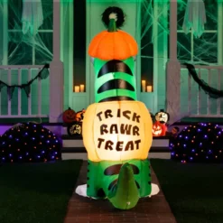 6ft Inflatable Dinosaur Halloween Decoration -Spirit Halloween Shop 6 ft Dinosaur Trick Raw Treat Inflatable 2 600x600 1