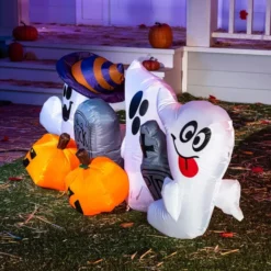 6ft Inflatable LED Ghost With Tombstones And Pumpkins -Spirit Halloween Shop 6 ft Long Horizontal Tombstones with Ghosts 5 600x600 1