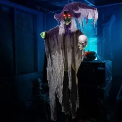 Animated Hanging Halloween Witch Decorations 85in -Spirit Halloween Shop 85 Animated Witch Holding a Skull 1 1 600x600 1