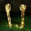 Light Up Skeleton Arms Yard Stake 1 Light Up Skeleton Arms Yard Stake -Spirit Halloween Shop Light Up Skeleton Arms Yard Stake 1 result 600x600 1