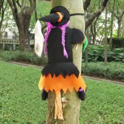 Purple Crashing Witch Into Tree Halloween Decoration -Spirit Halloween Shop Purple Crashing Witch Into Tree Halloween Decoration 4 600x600 1